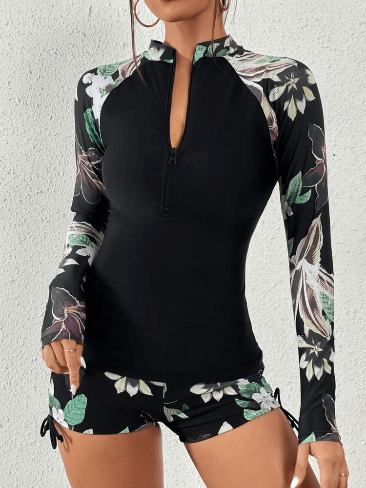 Stylish split women's long sleeve surfing swimwear in floral design, ideal for beach and surf adventures, SF0937.